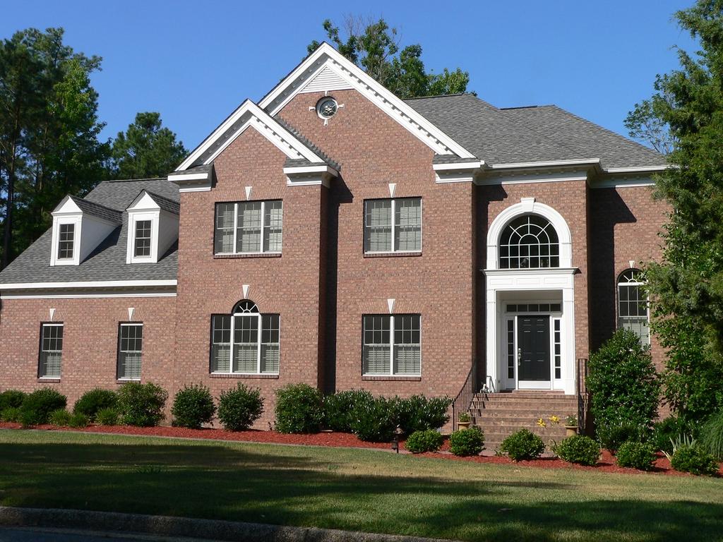 Brick Home With Ashcroft Rose