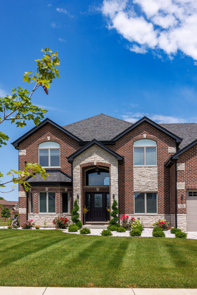 Brick Home with Tudor Williamsburg